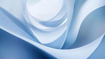 Blue and white image of a paper roll with a spiral shape. The image is abstract and has a calming effect photo