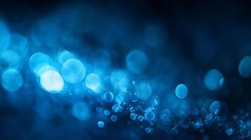 The image is a blue background with many small blue circles scattered throughout. The circles are of varying sizes and are placed in different positions, creating a sense of movement and depth photo