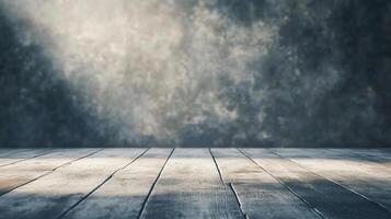 Wooden floor with a grey background. The floor is empty and has a lot of space. The grey background gives the impression of emptiness and loneliness photo