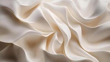 White fabric with a pattern of waves and ripples. The fabric is very soft and smooth to the touch photo