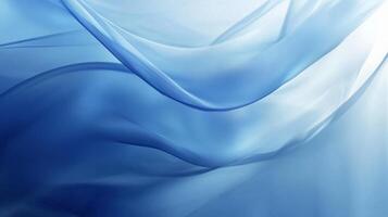 Blue and white striped fabric with a blue and white pattern. The fabric is flowing and has a sense of movement photo