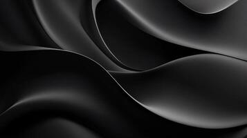 Black and white image of a wave with a black background. The image has a moody and mysterious feel to it photo