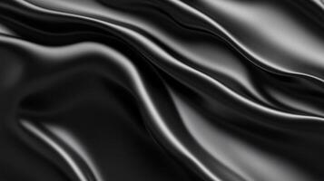 Black fabric with a shiny texture. The fabric is long and has a wave-like pattern photo