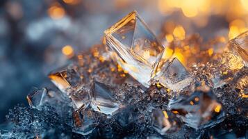 Close up of ice crystals with a warm orange glow. The ice crystals are scattered and appear to be melting. Concept of fragility and impermanence, as the ice crystals are constantly changing photo