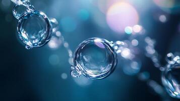 Series of small, clear bubbles floating in the air. The bubbles are scattered throughout the scene, with some closer to the foreground and others further away. Scene is one of tranquility photo
