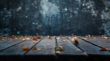 Wooden table with leaves scattered across it. Scene is calm and peaceful, as the leaves are gently falling and creating a serene atmosphere photo