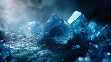 Blue ice cube with a cloudy background. The ice cube is surrounded by a pile of rocks photo