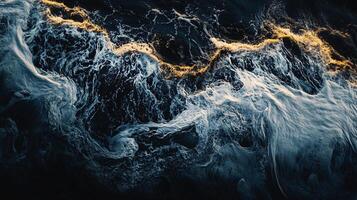 Large wave crashing into the shore. The water is dark blue and the wave is high, with foam and spray in the air. Scene is powerful and dynamic photo