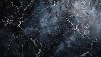 Black and white photo of a rocky surface with a few stars in the background. The photo has a moody and mysterious feel to it