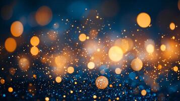 Bright blue background with a multitude of orange and blue dots scattered throughout. The dots are of varying sizes and are arranged in a way that creates a sense of movement and energy photo