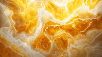 Yellow and white stone wall with a pattern of swirls and lines. The stone is textured and has a warm, inviting feel photo