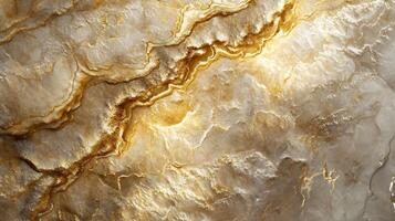 Gold and white wall with a pattern of waves. The wall is made of marble and has a shiny, reflective surface. The waves are created by the light reflecting off the wall photo