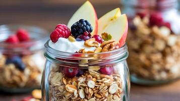 Granola with berries and nuts in a jar photo