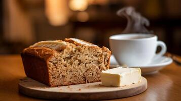 Banana bread and butter on a wooden table photo