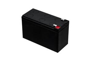 A black sealed lead-acid battery with two terminals, one marked with a red positive sign, isolated on a white background. photo