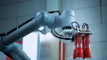 Robot arm Automation technology. Tools for saving energy effort and making the work of engineers more convenient in modern factories. Automation factory tech concept with robotic arms lifting goods. photo