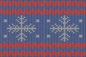 Snowflake Christmas themed knitted pattern with red and blue for printing, clothing, card, background, decoration vector