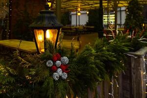 retro street lamp outside with New Year decorations photo