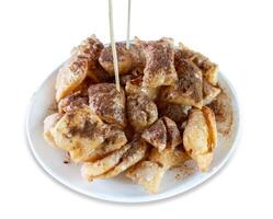Top view of roti topped with coco powder and condensed milk, focus selective photo