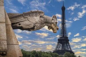 composite of images Eiffel Tower and gargoyle morning view of Paris photo