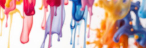 Colorful paint drips on a white background create an artistic abstract design showcasing vibrant hues and creativity photo