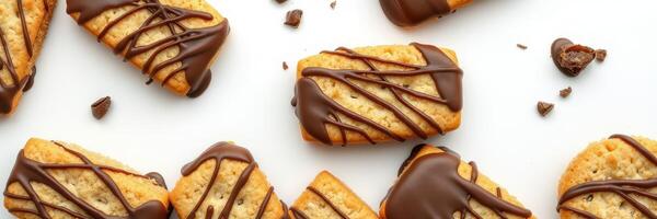 Delicious homemade cookies topped with rich chocolate drizzles arranged on a clean white background in a delightful display photo