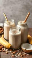 Delicious smoothies with bananas, coconut, and almonds on a wooden table enjoying a healthy breakfast photo