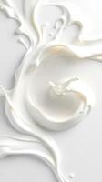 Swirls of cream create an elegant pattern on a smooth surface in a light setting photo