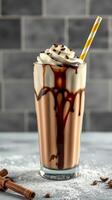 Indulgent chocolate milkshake with whipped cream and chocolate drizzle in a glass on a marble surface photo