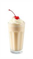 Creamy milkshake topped with whipped cream and cherry in a tall glass photo