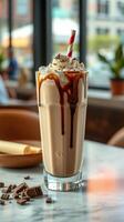 Creamy chocolate milkshake topped with whipped cream and a cherry at a cozy cafe during the afternoon photo