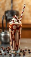 Delicious chocolate milkshake topped with whipped cream and chocolate drizzle in a glass photo