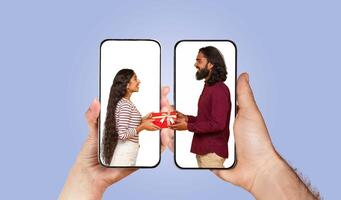 A couple enjoys a heartfelt exchange using their smartphones to connect from a distance. Their playful chat shows love as they share gifts virtually, enhancing their bond. photo