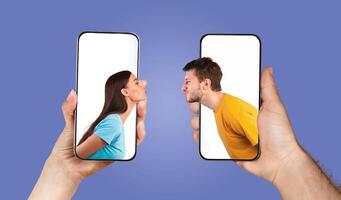 Two hands hold smartphones showcasing a couple expressing love and playfulness as they text, creating a unique interaction through technology in a vibrant setting. photo