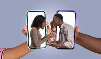 Two individuals express strong emotions while communicating via their smartphones. The conversation appears heated, with hands and devices prominently featured against a soft background. photo