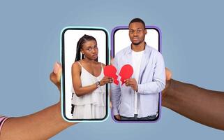 A couple holds smartphones displaying their faces while expressing emotions through chat applications. Hands emerge from two devices, showcasing a moment of connection and distance. photo