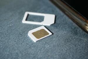 A sim card for a smart phone on table photo