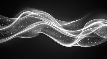 Soft waves of light and sparkling particles elegantly flow across a dark backdrop, creating a tranquil atmosphere photo