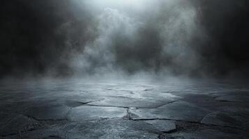 Thick fog shrouds rocky ground at twilight, creating an otherworldly, mysterious atmosphere photo