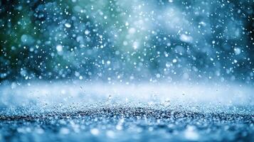 Raindrops create a tranquil atmosphere as they splash against a wet ground on a cloudy day photo