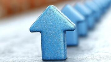 Bright blue arrows are positioned sequentially, symbolizing progress and upward movement in a bright setting photo