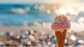 Ice Cream Cone with Sprinkles Against a Blurred Beach Background photo
