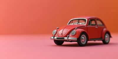 Classic red car on pink background photo