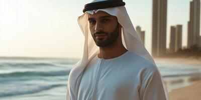 Man in traditional clothing by the sea photo