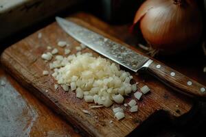 Chef chopping onions on wooden cutting board with knife photo