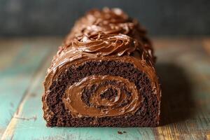 Delicious chocolate swiss roll cake resting on rustic wooden table photo