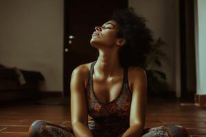 Young woman practices mindfulness and relaxation in a serene indoor setting with natural lighting and a relaxed posture photo