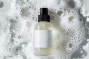 Clear spray bottle resting on soapy surface creating a clean and fresh appearance photo