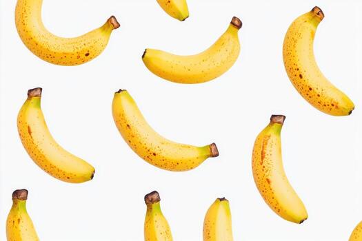 Various ripe yellow bananas arranged on a plain white background showcasing their natural texture and shape photo