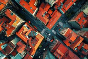 Bird's eye view of vibrant city intersection with red rooftops during daylight in a bustling urban environment photo